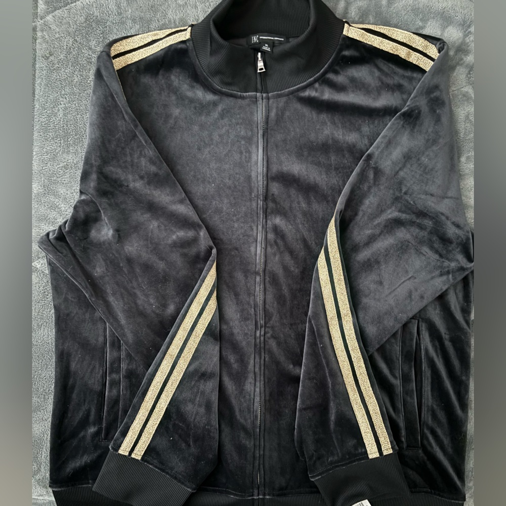 INC velour jump suit its a size XL black with gold pin strips